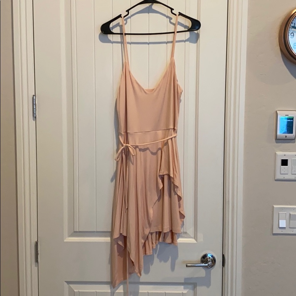 Pink/peach flirty dress. Great for spring.